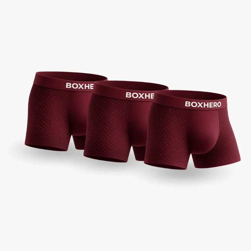 Three pairs of RED boxer briefs with 'BOXHERO' branding on a light gray background.